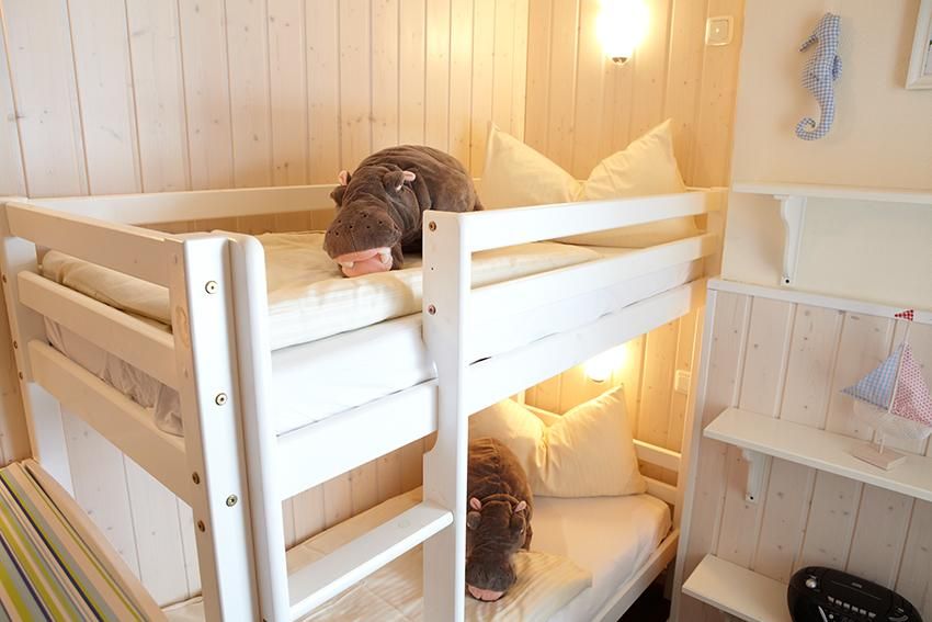 Ein Hochbett in einem Kinderzimmer einer Ferienwohnung an der Ostsee